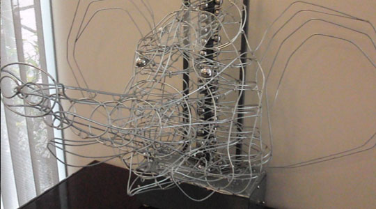 elephant rolling ball sculpture